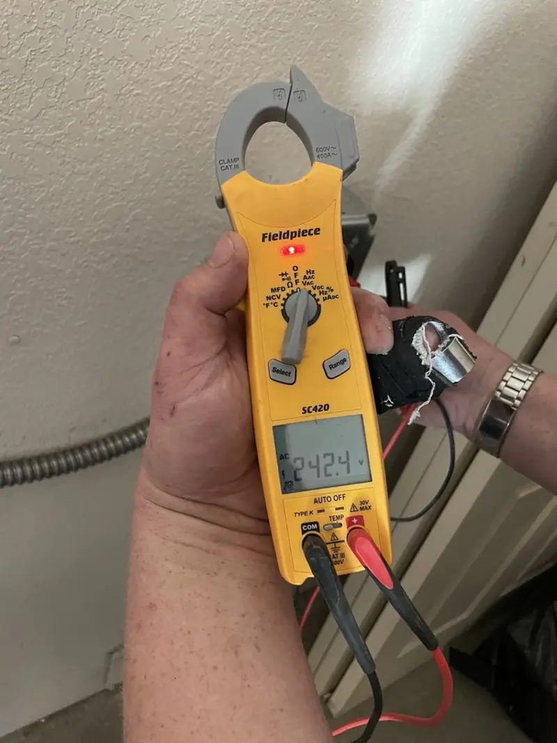 Voltage testing with clamp meter during Recessed Lighting Installation in Bridgeton